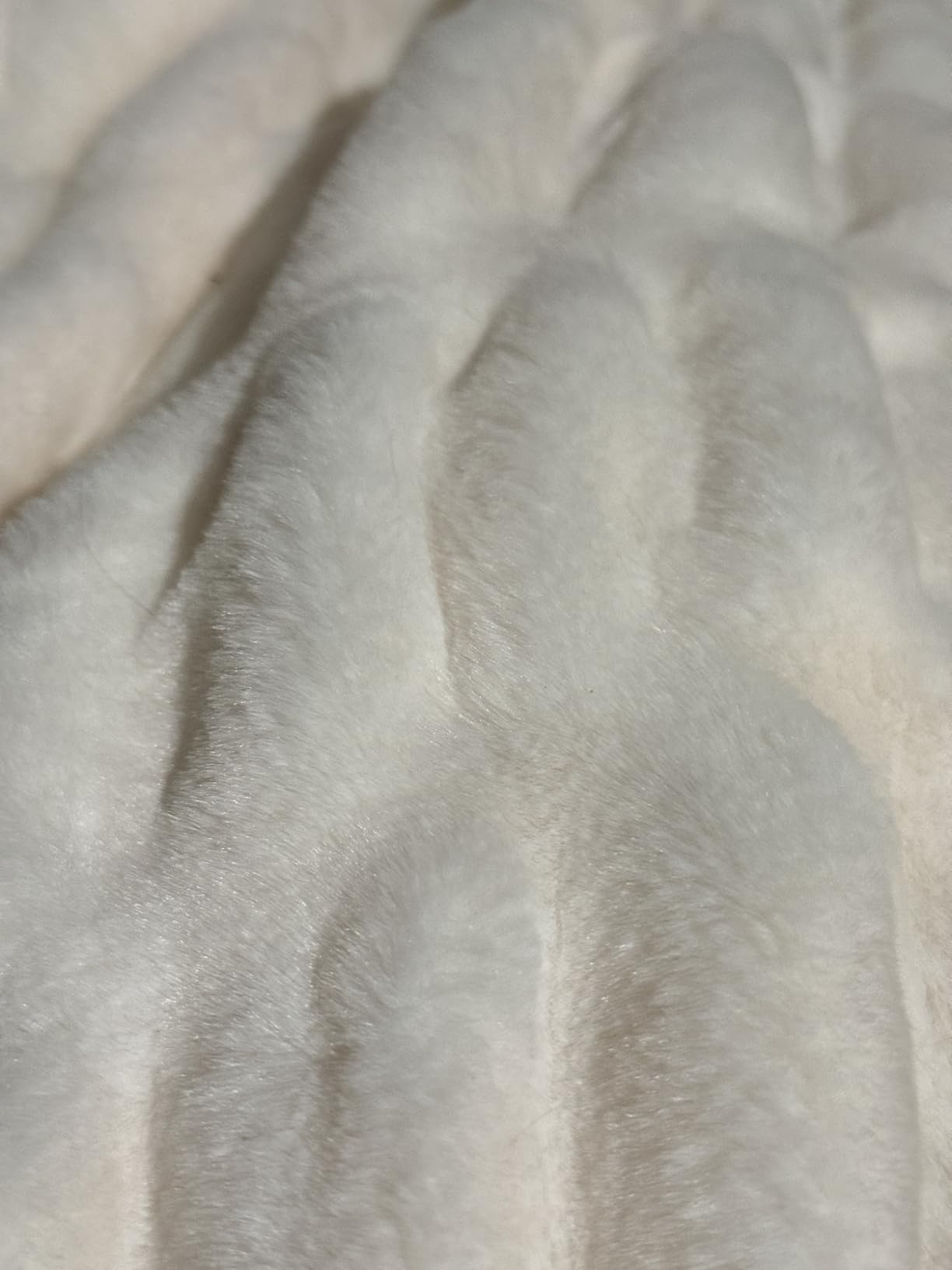 Close-up of lush textured Aruva SereneWeave throw fabric with gentle wavy pattern